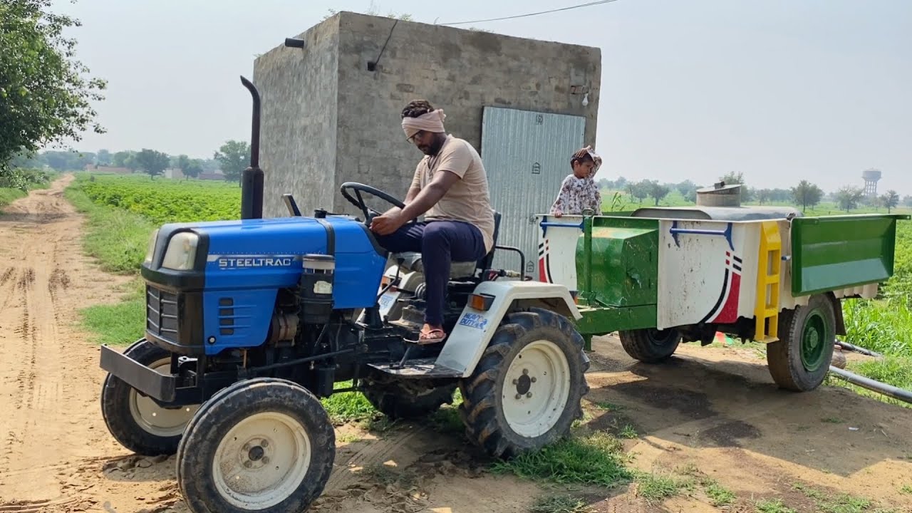 My Mini Steeltrac Tractor is going to fetch water in the field | Mini Tractor Trolley