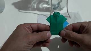 Como fazer uma camisa de origami