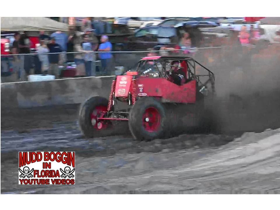 mud racing cars Split Decisions Mega Truck...Rockin' down the Track.