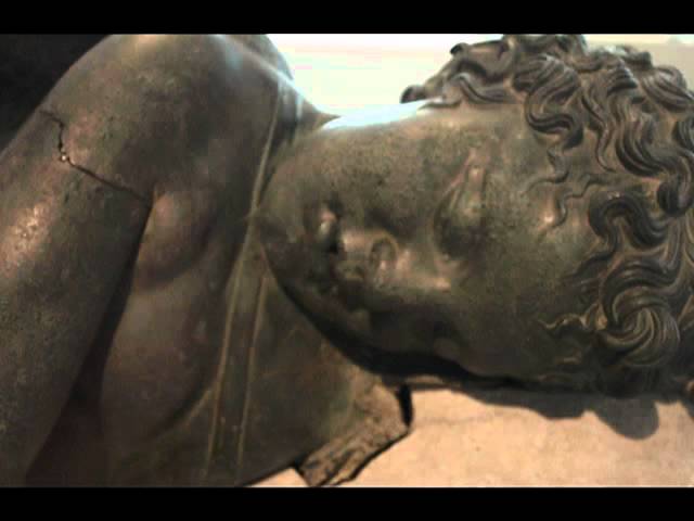 bronze statue of eros sleeping