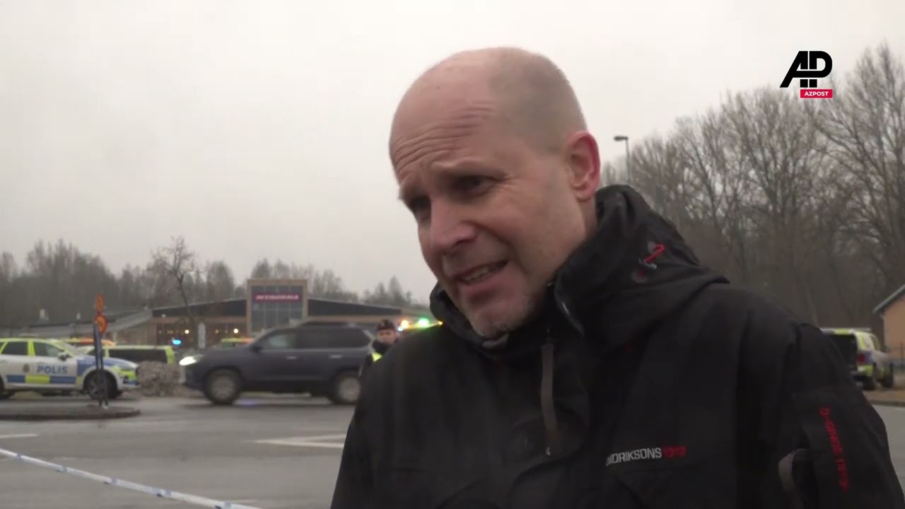 Father in phone contact with daughter, relays her anguish and teachers' help during attack