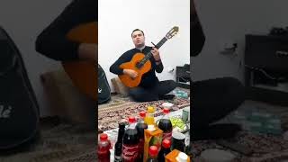 Turkmen gitara Muhammet Caryyew