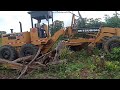 Motor Grader Makes New Short Roads By Breaking Through Wood Cuts