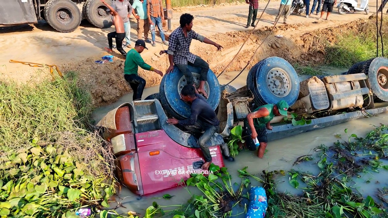 Video documentary of all overturned and danger earth moving truck with help of crane experts.