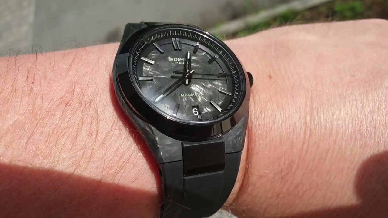 Casio Edifice EFK-100XPB-1A carbon case and dial in sunlight
