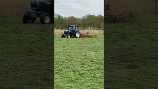 #shorts New Holland Ford working the fields. Hooray hooray it is grass day! #tractor #farming #grass
