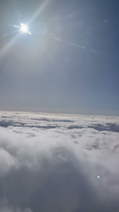 Clouds look like cotton candy #sky #sun #plane #cottoncandy #poof# #