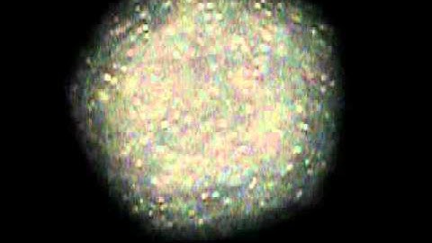 Smoke particles observed in a microscope