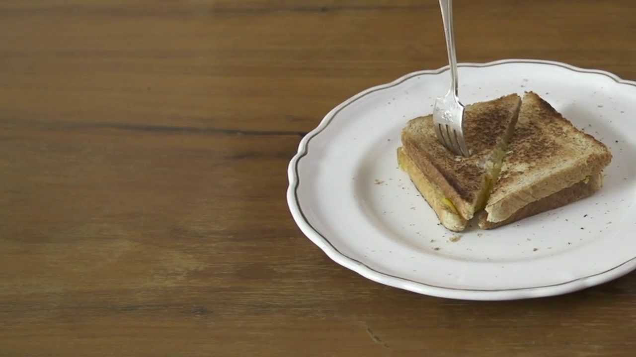 The Sims 4 - Melty Grilled Cheese Sandwich - A grilled cheese sandwich.  An unlisted Easter egg from The Sims 4 trailer.