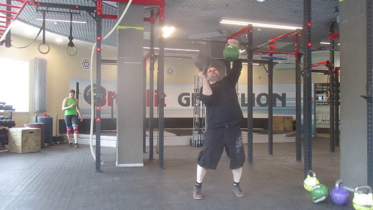 Жим 57,5 кг (33,5+24) напопа и удержание на время.57,5kg bottom up stacked kettlebells press
