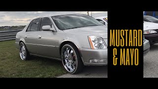 Cadillac DTS on 22" rims and Vogues