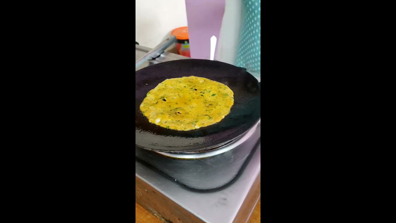 Hardworking Woman Making Thalipeeth