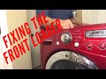 LG front loader washing machine banging and smoking