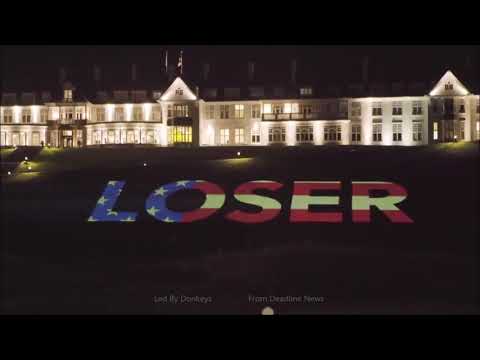 Political campaigners project huge "LOSER" illumination on Trump's Scottish golf course
