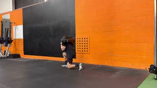 Sandbag Walking Lunges