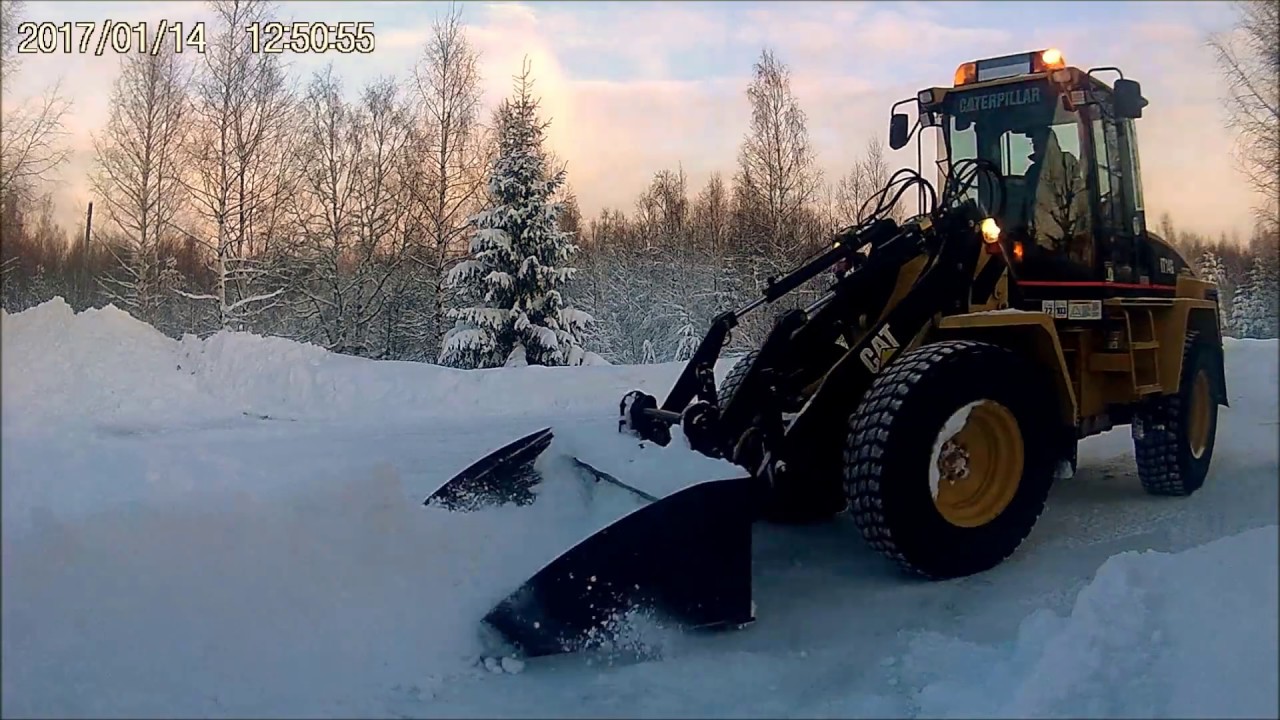 CAT - Caterpillar IT14G plowing snow - sweden - Skottar, plogar snö i Norrbotten med planeringsskopa
