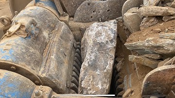 "Stone Crusher Machine: A Giant at Work"The Power of Stone: Machine Working in Action"#stonecrusher