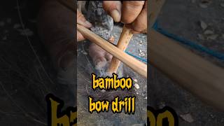 bow drill using bamboo fireboard #primitivefire #survival