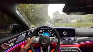 AMG GT63s IN CUTTING UP IN THE RAIN POV