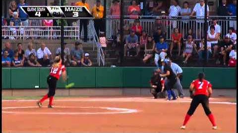 Alex Hugo does the limbo under the ball, and slides home safely!