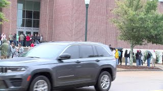 Crowds of people line up ahead of TPUSA event