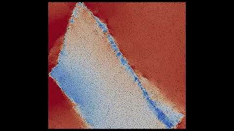 Uniaxial compression of dense packing of bulk material - displacement magnitude