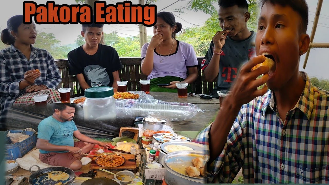 Eating Pakora  and Parata with friends