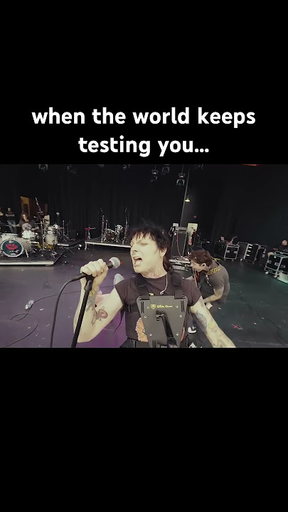 crazy fan runs on stage and fights band
