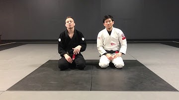 Surprise arm bar from bottom side control