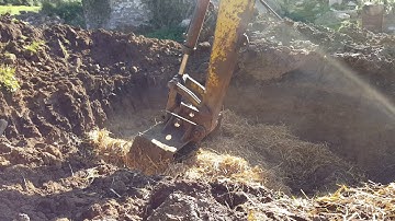 cob mixing with digger