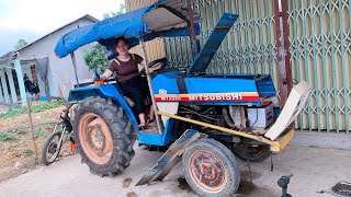 The broken Mitsubishi tractor was repaired by the girl / ly xuan kieu