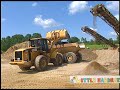 Big Bucket Loader Loads Sand Into Giant Off-road Haul Truck, Road Construction Ahead 2