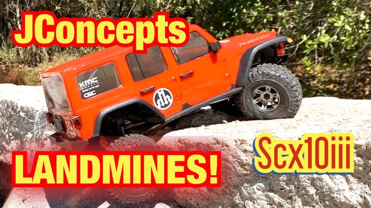 Осевой SCX10iii с шинами JConcepts Landmine