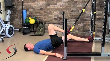 TRX alternating hamstring curls
