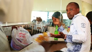 Waiter throwing away Customers' Food