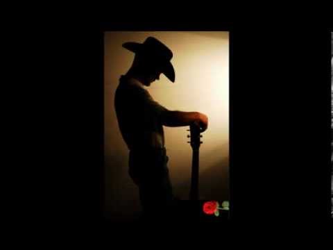 Watch the video for Esta triste guitarra
