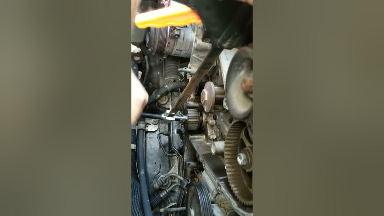 Removing a timing gear sprocket from a 2007 dodge nitro R/T 4.0L oil