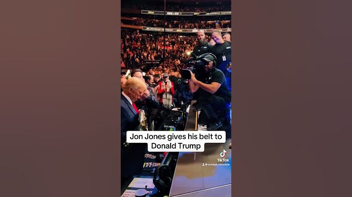 Jon Jones gives his belt to Donald Trump at UFC 309 #ufc #mma #ufc309 #jonjones #donaldtrump