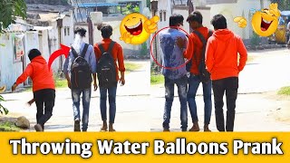 Throwing Water Ballons on People Prank || Ulta gang || Telugu prank || Water Ballons Prank by Ulta gang 9,903 views 2 years ago 5 minutes, 28 seconds