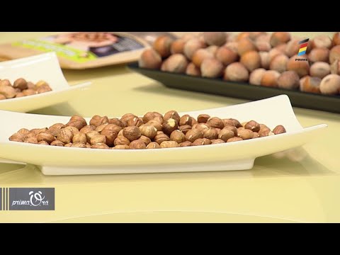 Video: Cât este 1 oz de alune în căni?