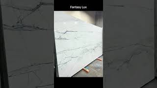 Fantasy Lux quartzite. #interiordesign #kitchendesign #elegantkitchen #countertop #remodeling