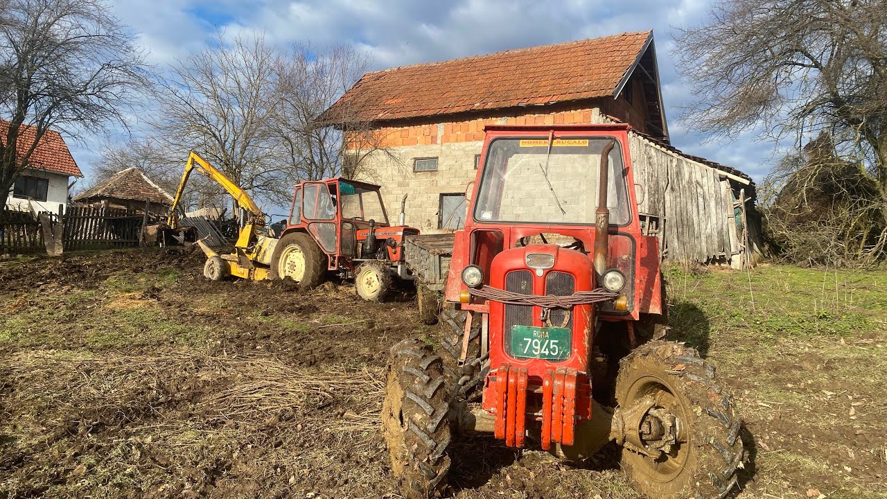 Vučemo đubre kod komšije Dragana sa tri traktora po blatu 
