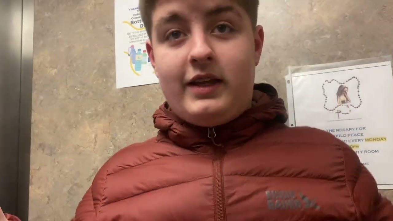  Jake rides the Riverview Apartments elevator ￼