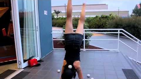 5 ball cascade into neck catch into handstand :)