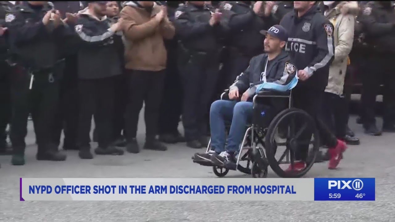 NYPD officer leaves hospital after he was shot in arm - YouTube