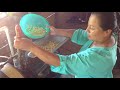 Mayan Woman Grinding Corn for Tortillas in Belize