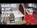 Making a 20 inch sanding disk. Making a 20 inch sanding disk.