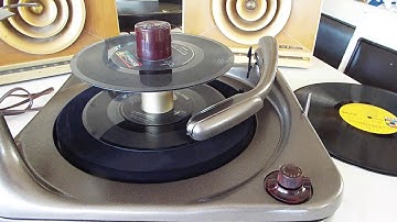 Voice of Music 3 speed automatic record changer playing a stack of 45