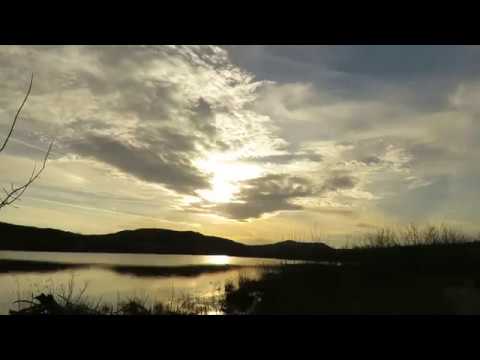 Rush Lake looks like a glass mirror in the Wichita Mountains Wildlife