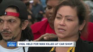 Vigil held for man killed at car shop